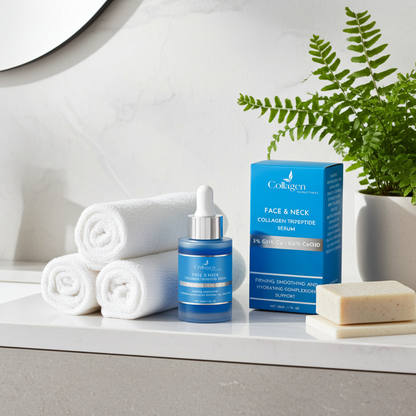 Cosmetic products including a bottle, box, and soap on a white surface with towels and a plant in the background.